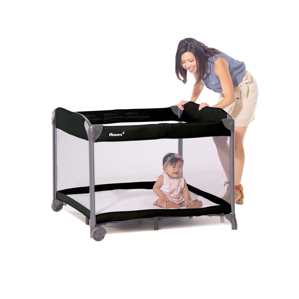 Joovy Roomยฒ Large Portable Playpen for Babies and Toddlers with Nearly 10 sq ft of Space, Large Mesh Windows for 360 View, and Waterproof Mattress Sheet - Folds Easily when Not in Use (Black)