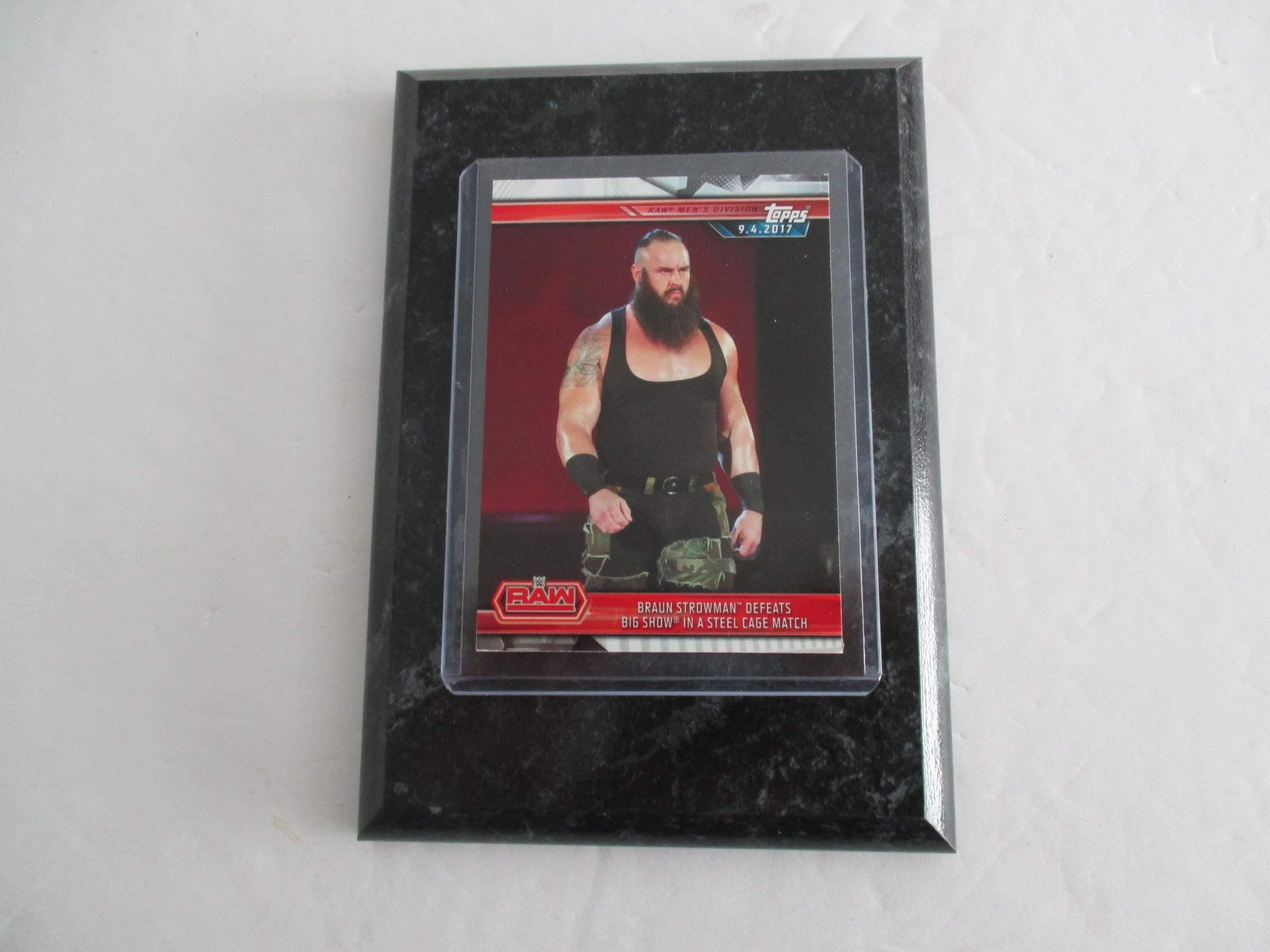 BRAUN STROWMAN"DEFEATS BIG SHOW IN A STEEL CAGE MATCH" (9/4/2017) 2019 WWE RAW TOPPS COLLECTABLE CARD MOUNTED ON A 4" X 6" BLACK MARBLE PLAQUE