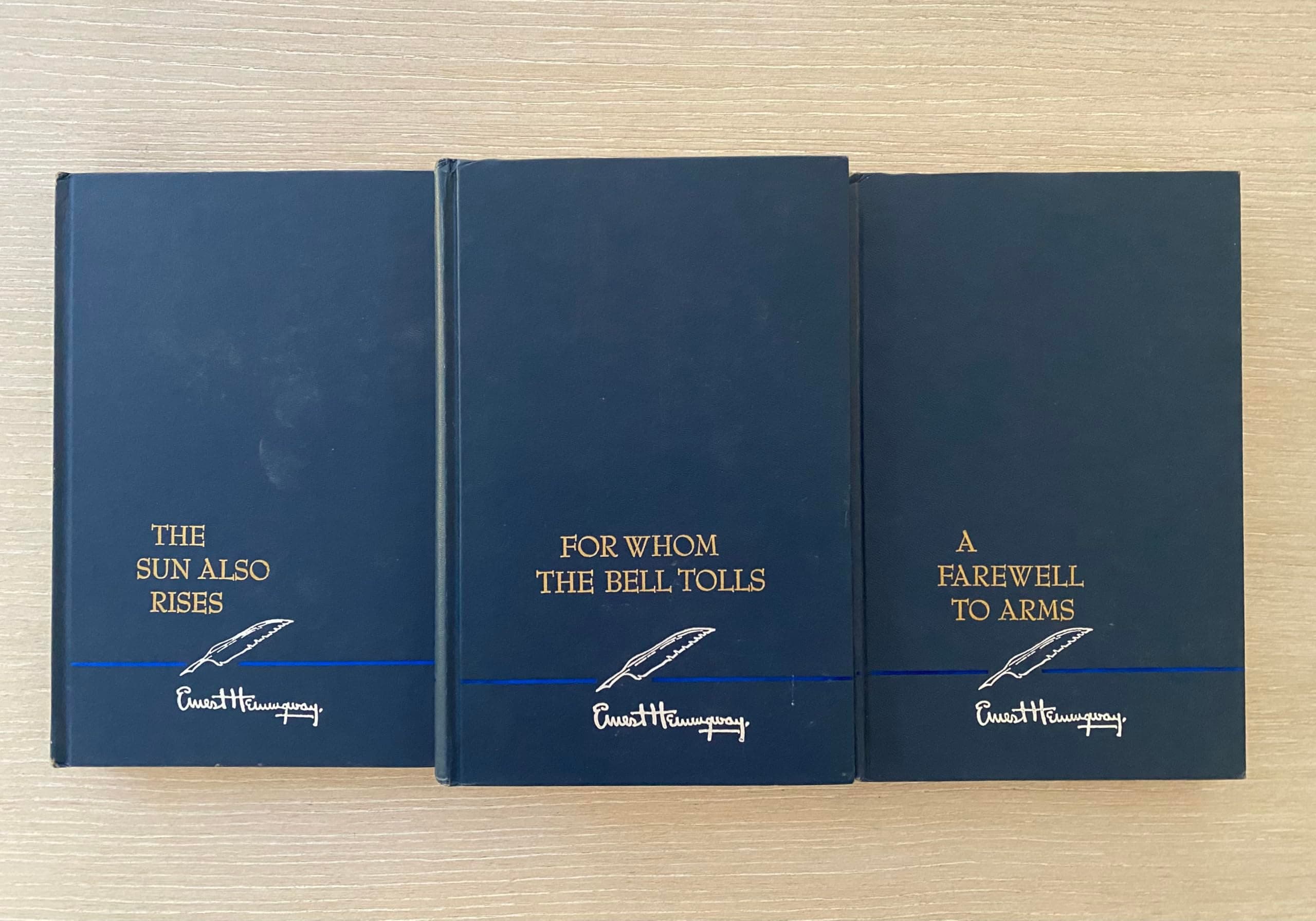 Set of Three Ernest Hemingway Novels. For Whom the Bell Tools 1968, a Farewell to Arms 1957, and the Sun Also Rises 1954 Unknown Binding