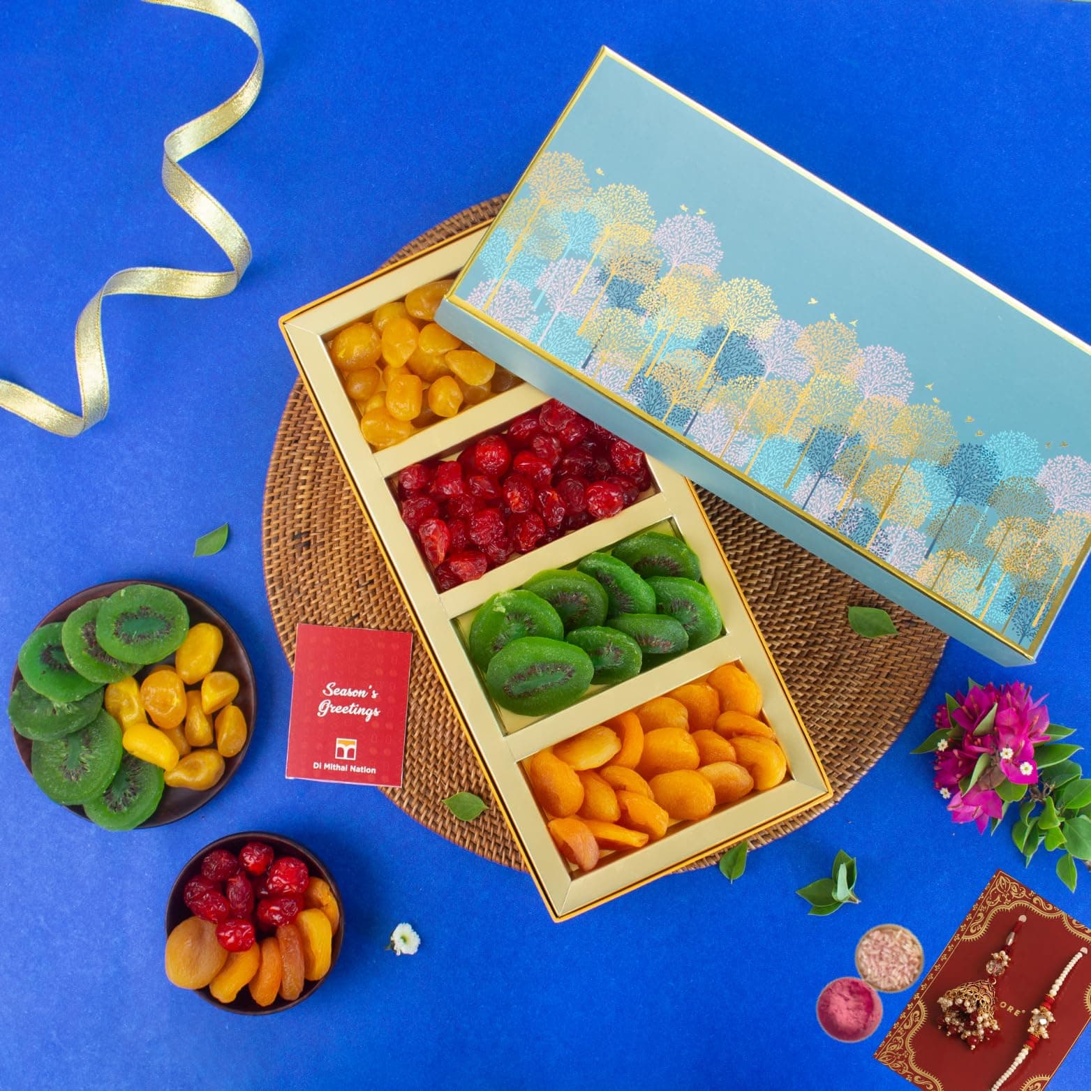 DI MITHAI NATION Sun Dried Kiwi, Baby Lemon, Cherry and Dried Apricot (50 gm each) In Classic Blue Tree Box with Padmini Red Bhaiya Bhabhi Rakhi Set for Rakshabandhan Gift Pack