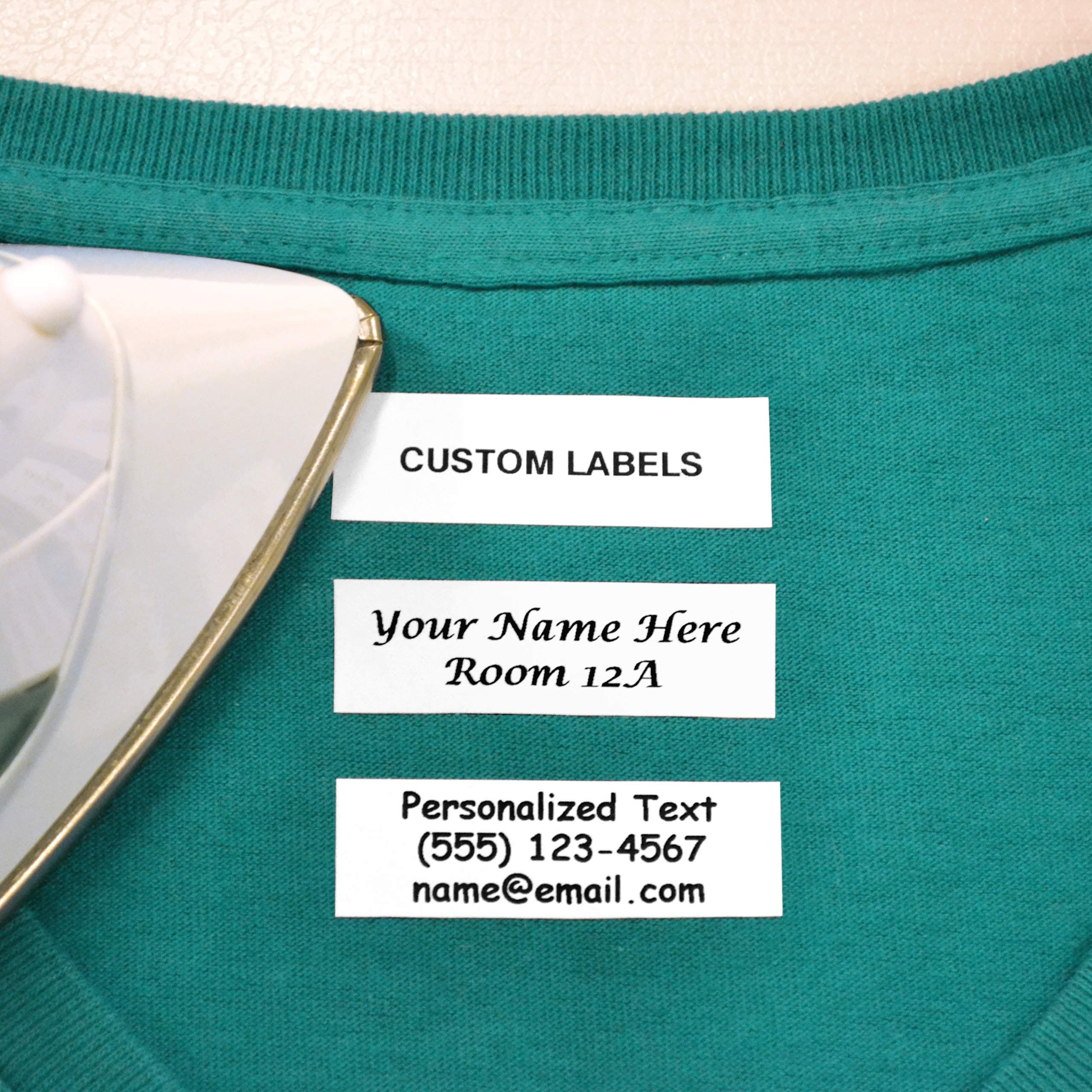 100 PreCut Iron On Personalized Fabric Clothing Name Labels with Font Choice. Custom 2”x5/8” Laundry Tag for Nursing Home, Camp, School, Day Care, Uniforms and Crafts. Child Safe Label.