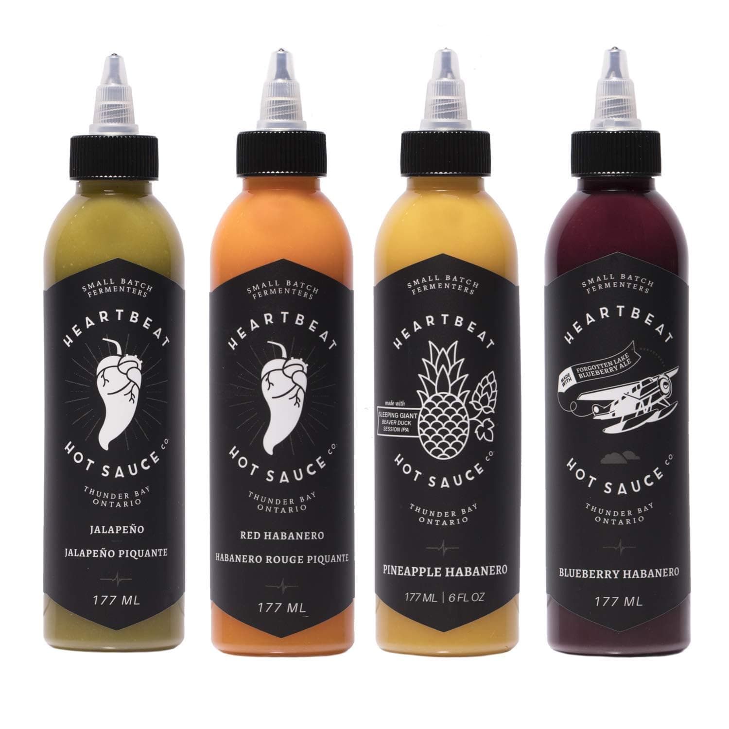 Heartbeat Hot Sauce 4 Pack- 4 Bottles of 6 oz- Small Batch & Handmade, Vegan, Preservative Free- Pineapple Habanero, Red Habanero, Blueberry Habanero, Jalapeño